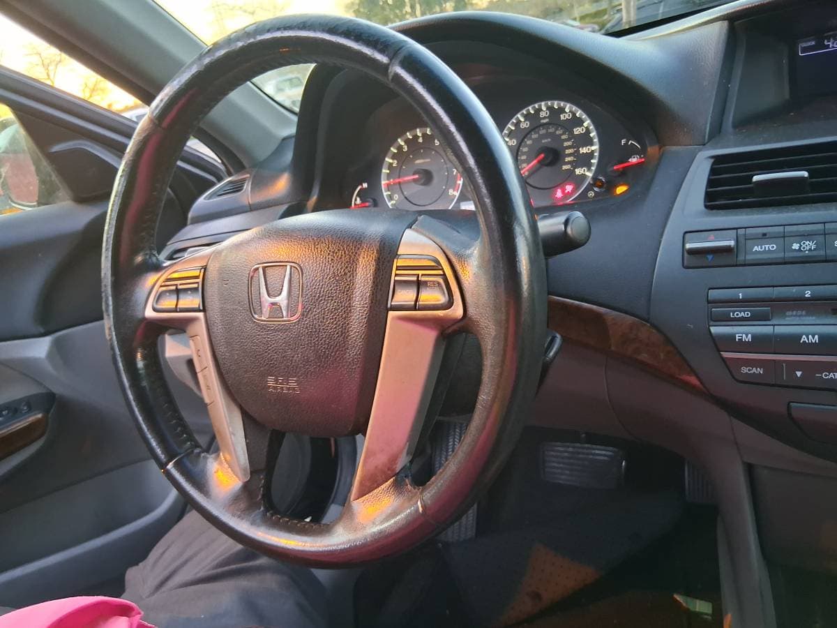 picture of a Honda car electrical component being worked on by a mobile mechanic at FIX4U